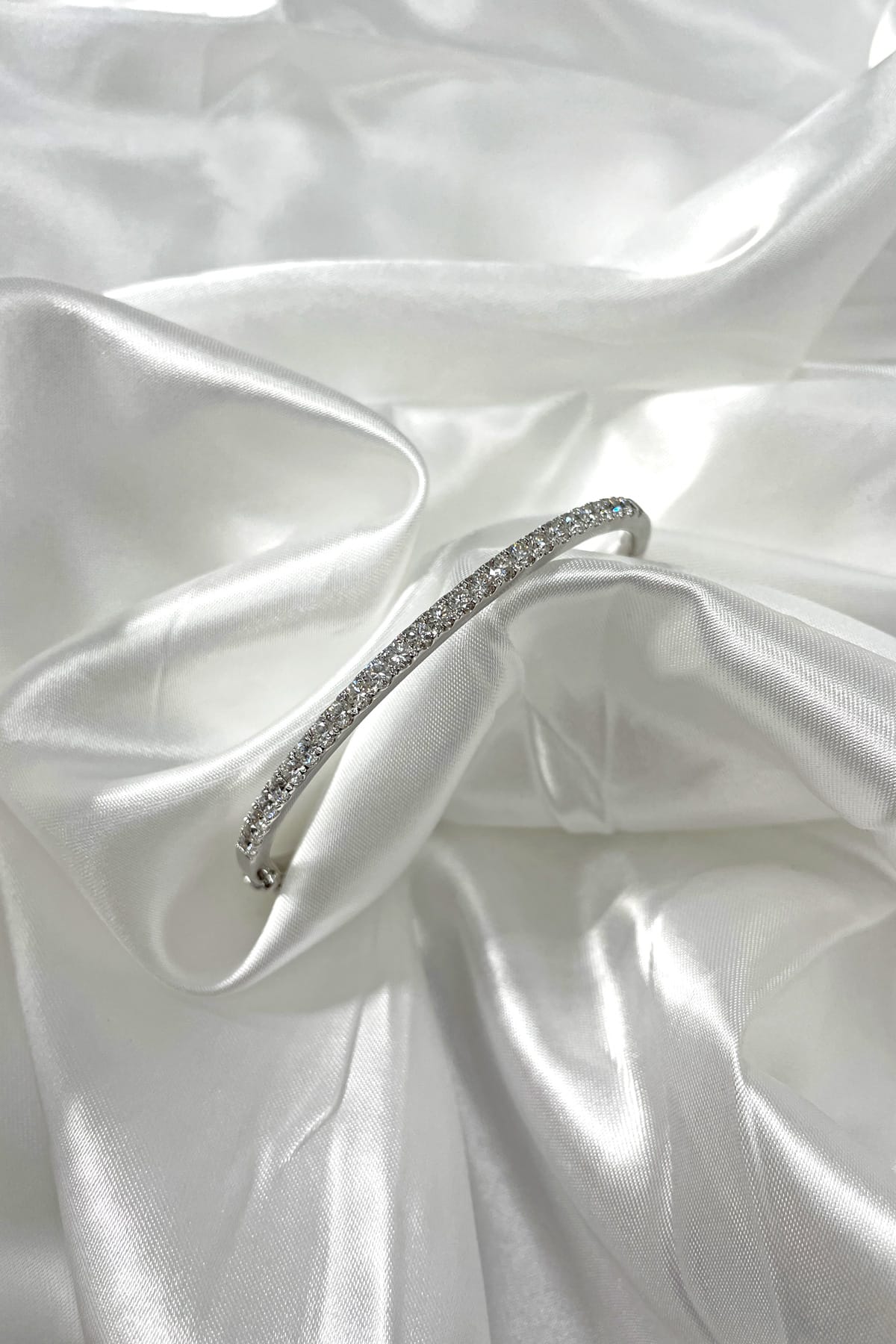 18 Carat White Gold Diamond Set Bangle available at LeGassick Diamonds and Jewellery Gold Coast, Australia.