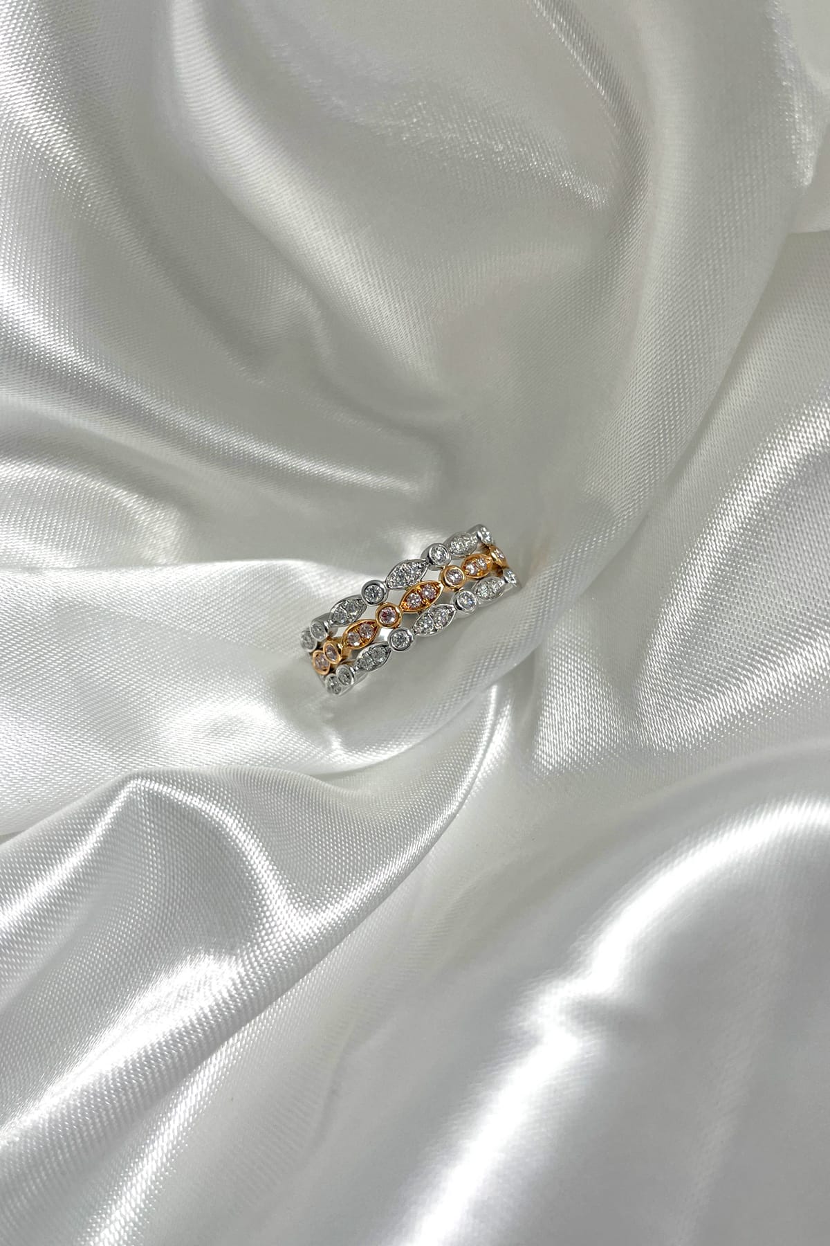 18 Carat White And Rose Gold 3 Row Diamond Ring available at LeGassick Diamonds and Jewellery Gold Coast, Australia.