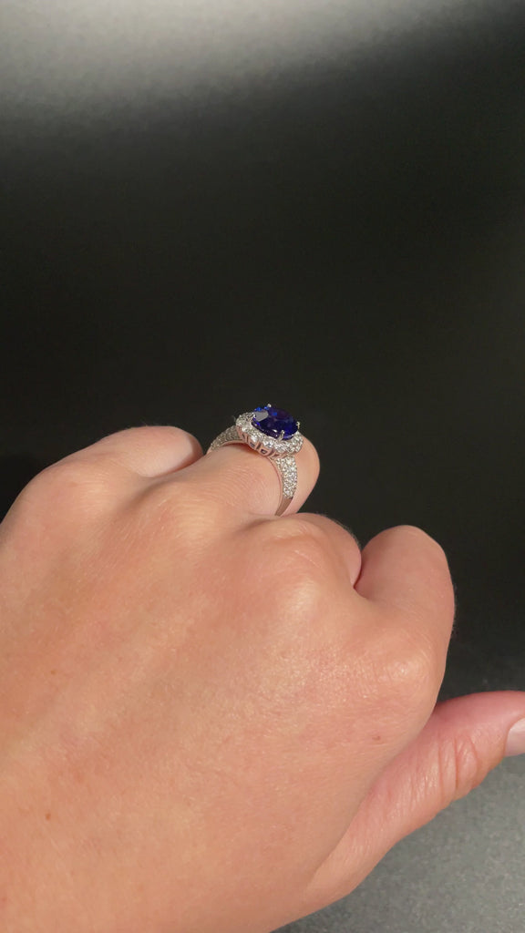 18ct white gold 6.05CT OVAL TANZANITE AND DIAMOND RING available at LeGassick Diamonds and Jewellery Gold Coast, Australia.