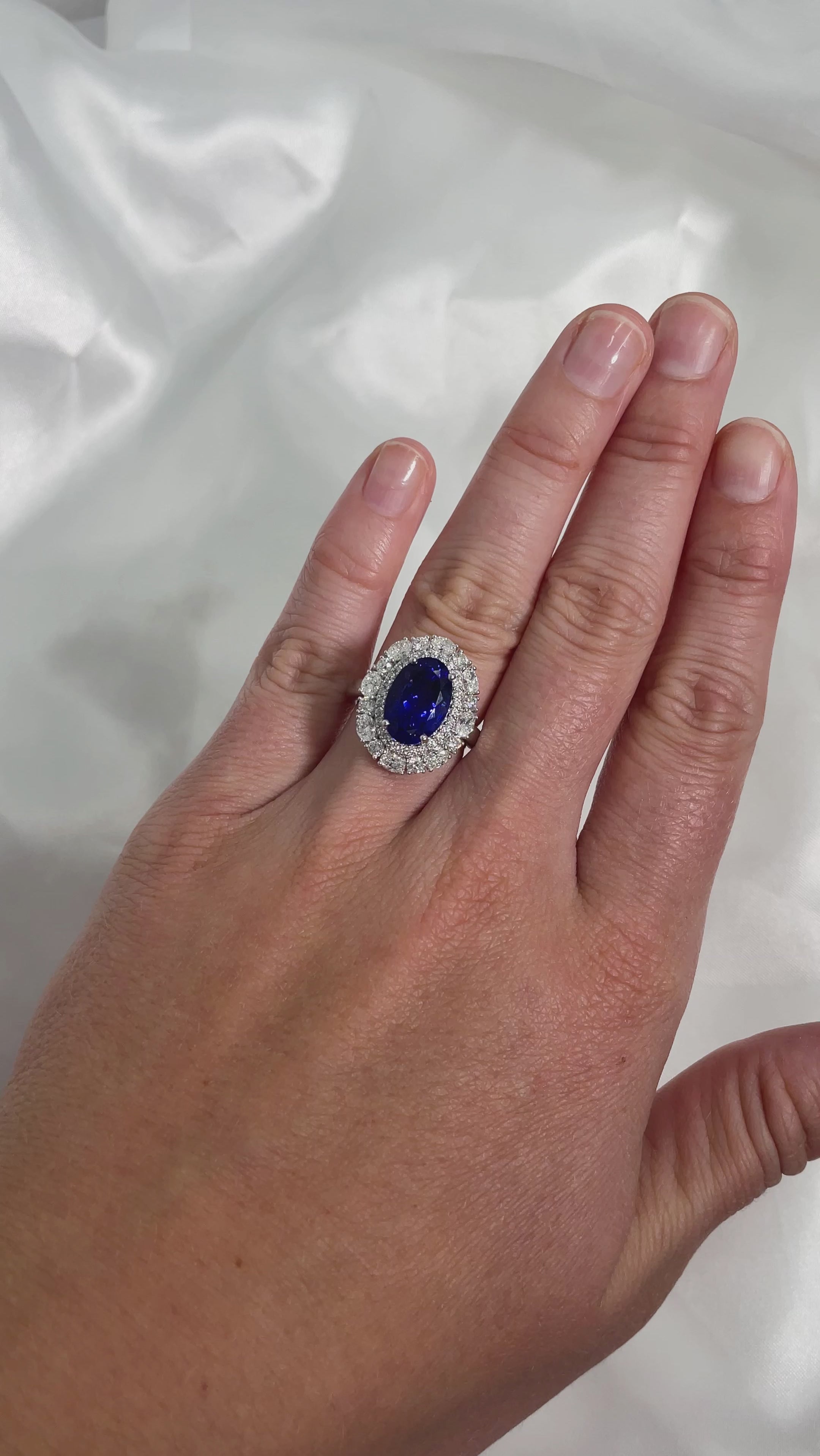 18CT WG 5.80CT OVAL TANZANITE AND DOUBLE DIAMOND HALO RING available at LeGassick Diamonds and Jewellery Gold Coast, Australia.