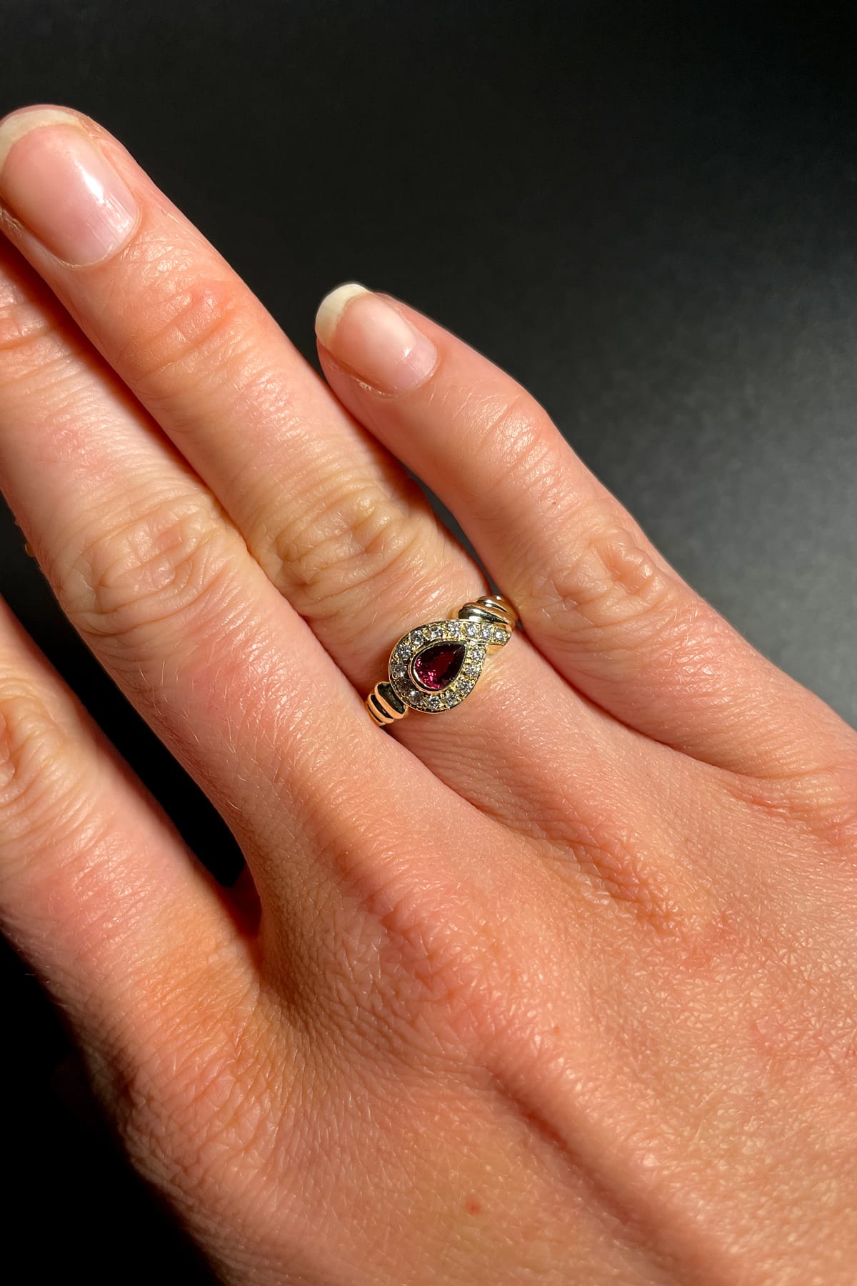 So thrilled about my Emerald Cut Ruby ring with pear side stones! :  r/EngagementRings