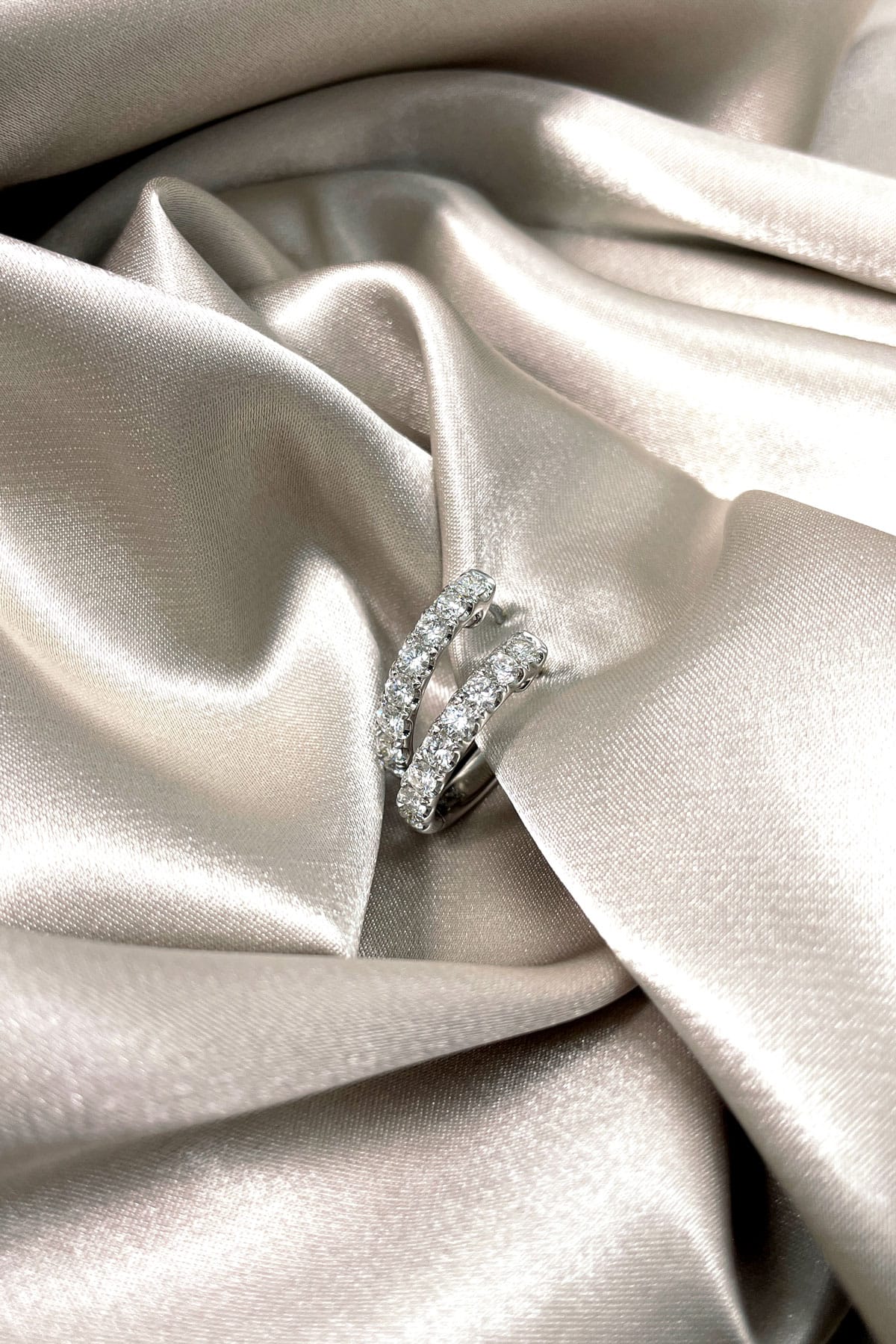18 Carat White Gold Diamond Set Oval Huggie Earrings available at LeGassick Diamonds and Jewellery Gold Coast, Australia.
