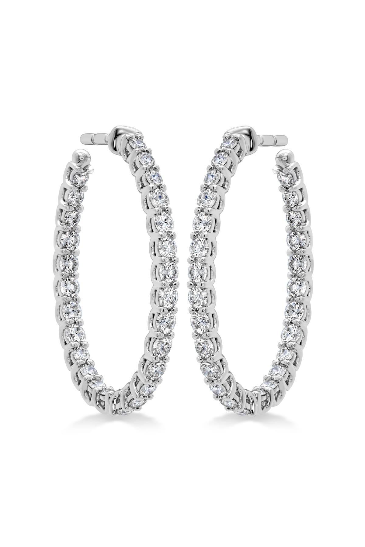 Medium Signature Oval Hoop Earrings From Hearts On Fire available at LeGassick Diamonds and Jewellery Gold Coast, Australia.