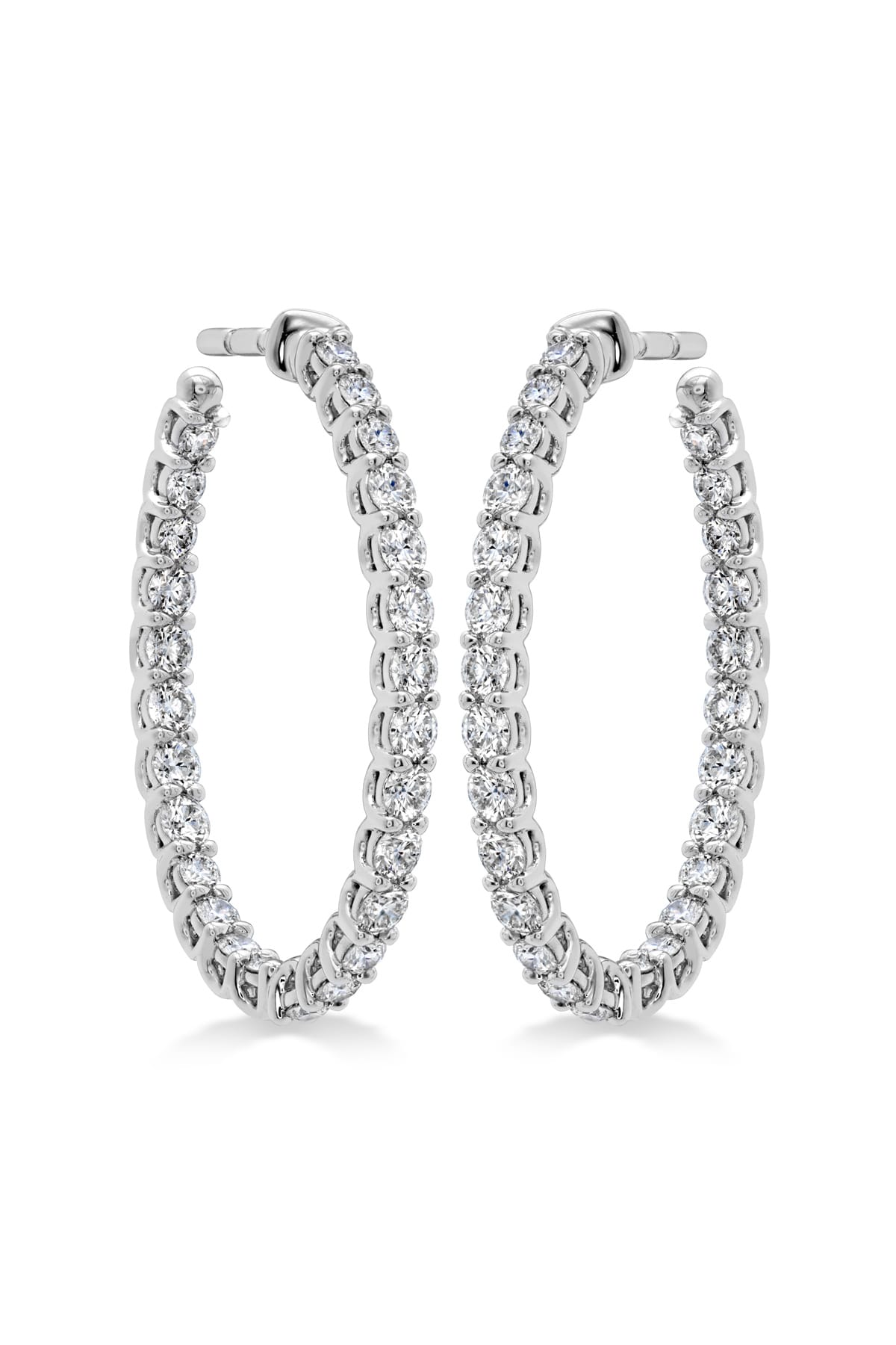 Medium Signature Oval Hoop Earrings From Hearts On Fire available at LeGassick Diamonds and Jewellery Gold Coast, Australia.