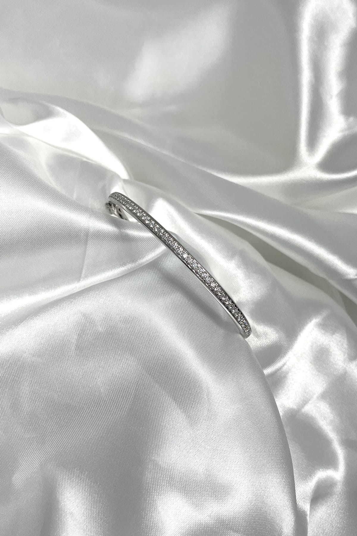 White Gold Oval Hinged Diamond Set Bangle available at LeGassick Diamonds and Jewellery Gold Coast, Australia.